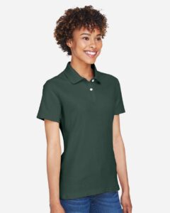 Devon & Jones DG150W Women’s DRYTEC20™ Performance Polo – Forest (on model side)
