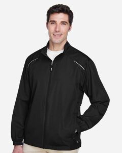 CORE365 88183 Men’s Techno Lite Motivate Unlined Lightweight Jacket – Black (on model side)