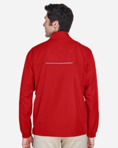 CORE365 88183 Men’s Techno Lite Motivate Unlined Lightweight Jacket – Classic Red (on model back)