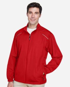 CORE365 88183 Men’s Techno Lite Motivate Unlined Lightweight Jacket – Classic Red (on model side)