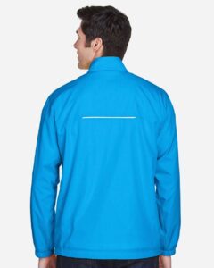 CORE365 88183 Men’s Techno Lite Motivate Unlined Lightweight Jacket – Electric Blue (on model back)