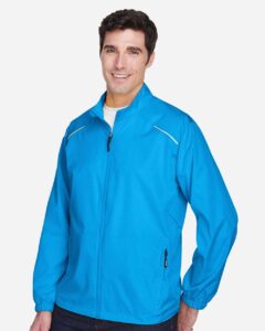 CORE365 88183 Men’s Techno Lite Motivate Unlined Lightweight Jacket – Electric Blue (on model side)