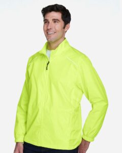 CORE365 88183 Men’s Techno Lite Motivate Unlined Lightweight Jacket – Safety Yellow (on model side)