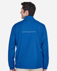 CORE365 88183 Men’s Techno Lite Motivate Unlined Lightweight Jacket – True Royal (on model back)