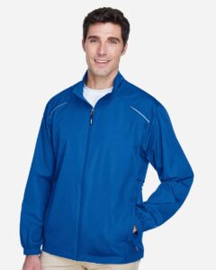 CORE365 88183 Men’s Techno Lite Motivate Unlined Lightweight Jacket – True Royal (on model side)
