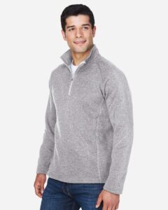 Devon & Jones DG792 Unisex Bristol Sweater Fleece Quarter-Zip Pullover – Grey Heather (on model side)