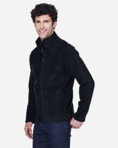 CORE365 88190 Men’s Journey Fleece Jacket – Black (on model side)