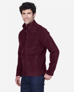 CORE365 88190 Men’s Journey Fleece Jacket – Burgundy (on model side)
