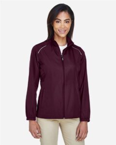 CORE365 78183 Women’s Techno Lite Motivate Unlined Lightweight Jacket – Burgundy (on model)