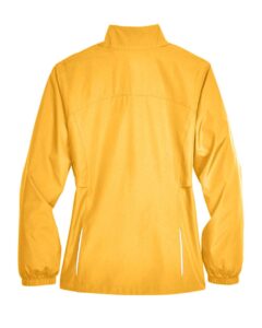 CORE365 78183 Women’s Techno Lite Motivate Unlined Lightweight Jacket – Campus Gold (back)