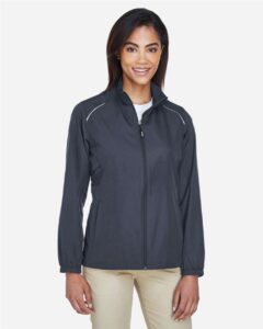 CORE365 78183 Women’s Techno Lite Motivate Unlined Lightweight Jacket – Carbon (on model)