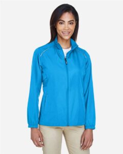CORE365 78183 Women’s Techno Lite Motivate Unlined Lightweight Jacket – Electric Blue (on model)
