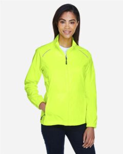 CORE365 78183 Women’s Techno Lite Motivate Unlined Lightweight Jacket – Safety Yellow (on model)