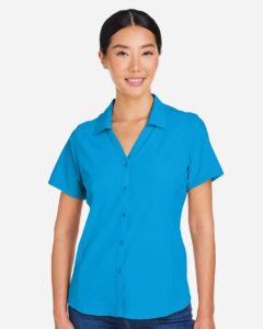 CORE365 CE510W Women’s Ultra UVP® Marina Shirt – Electric Blue (on model)