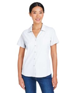 CORE365 CE510W Women’s Ultra UVP® Marina Shirt – White (on model)