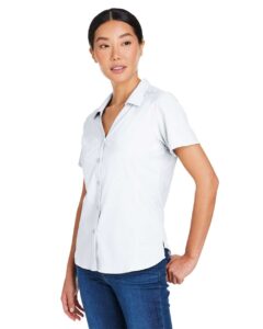 CORE365 CE510W Women’s Ultra UVP® Marina Shirt – White (on model side)