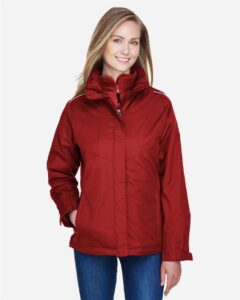 CORE365 78205 Women’s 3-in-1 Jacket with Fleece Liner – Classic Red (on model)