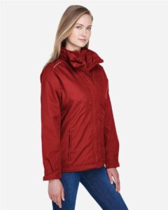 CORE365 78205 Women’s 3-in-1 Jacket with Fleece Liner – Classic Red (on model side)