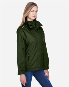 CORE365 78205 Women’s 3-in-1 Jacket with Fleece Liner – Forest (on model side)