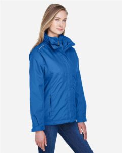 CORE365 78205 Women’s 3-in-1 Jacket with Fleece Liner – True Royal (on model side)