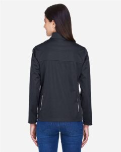 CORE365 CE708W Women’s Techno Lite Three-Layer Knit Tech-Shell – Black (on model back)