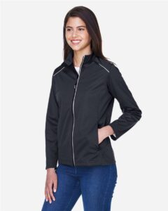 CORE365 CE708W Women’s Techno Lite Three-Layer Knit Tech-Shell – Black (on model side)