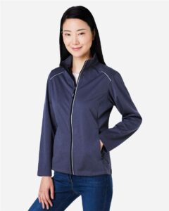 CORE365 CE708W Women’s Techno Lite Three-Layer Knit Tech-Shell – Classic Navy Heather (on model side)