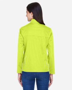 CORE365 CE708W Women’s Techno Lite Three-Layer Knit Tech-Shell – Safety Yellow (on model back)