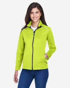 CORE365 CE708W Women’s Techno Lite Three-Layer Knit Tech-Shell – Safety Yellow (on model)