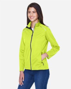 CORE365 CE708W Women’s Techno Lite Three-Layer Knit Tech-Shell – Safety Yellow (on model side)