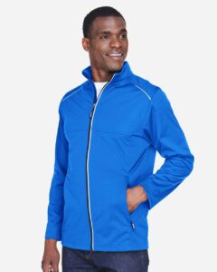 CORE365 CE708 Men’s Techno Lite Three-Layer Knit Tech-Shell – True Royal (on model side)