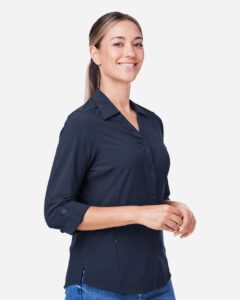 CORE365 CE510LW Women’s Ultra UVP® Marina Shirt – Classic Navy (on model side)