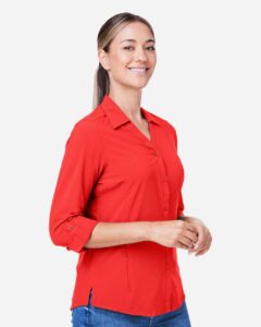 CORE365 CE510LW Women’s Ultra UVP® Marina Shirt – Marina Red (on model side)