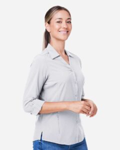 CORE365 CE510LW Women’s Ultra UVP® Marina Shirt – Platinum (on model side)