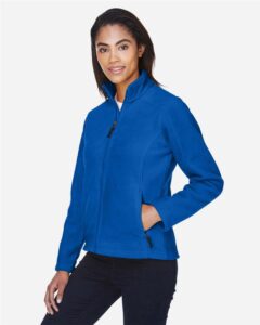 CORE365 78190 Women’s Journey Fleece Jacket – True Royal (on model side)
