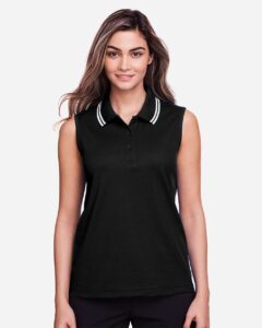 Devon & Jones DG20SW Women’s CrownLux Performance® Plaited Tipped Sleeveless Polo – Black/ White (on model)