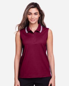 Devon & Jones DG20SW Women’s CrownLux Performance® Plaited Tipped Sleeveless Polo – Burgundy/ White (on model)