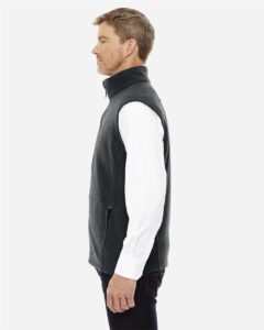 CORE365 88191T Men’s Tall Journey Fleece Vest – Heather Charcoal (on model side)