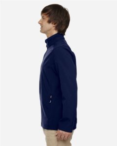 CORE365 88184T Men’s Tall Cruise Two-Layer Fleece Bonded Soft Shell Jacket – Classic Navy (on model side)