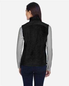 CORE365 78191 Women’s Journey Fleece Vest – Black (on model back)