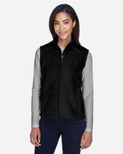CORE365 78191 Women’s Journey Fleece Vest – Black (on model)