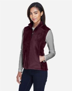 CORE365 78191 Women’s Journey Fleece Vest – Burgundy (on model side)