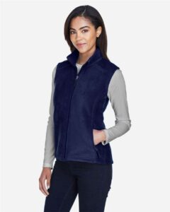 CORE365 78191 Women’s Journey Fleece Vest – Classic Navy (on model side)