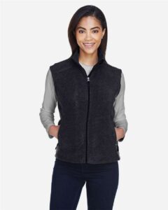 CORE365 78191 Women’s Journey Fleece Vest – Heather Charcoal (on model)
