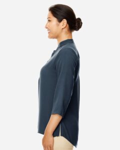 Devon & Jones DP611W Women’s Perfect Fit™  Three-Quarter Sleeve Crepe Tunic – Navy (on model side)