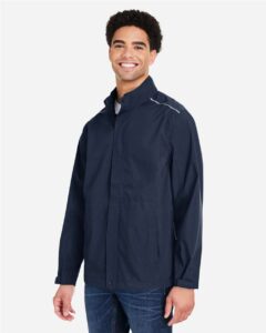 CORE365 CE712 Men’s Barrier Packable Rain Jacket – Classic Navy (on model side)