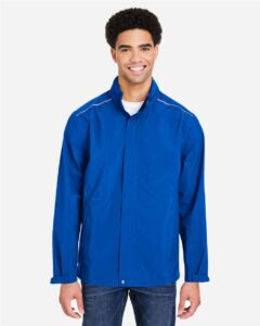 CORE365 CE712 Men’s Barrier Packable Rain Jacket – True Royal (on model)