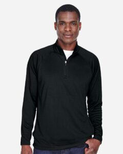 Devon & Jones DG440 Men’s Stretch Tech-Shell® Compass Quarter-Zip Pullover – Black (on model)