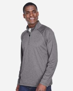 Devon & Jones DG440 Men’s Stretch Tech-Shell® Compass Quarter-Zip Pullover – Dark Grey Heather (on model side)