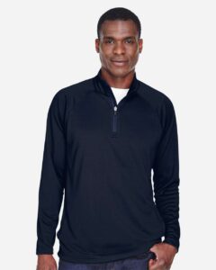 Devon & Jones DG440 Men’s Stretch Tech-Shell® Compass Quarter-Zip Pullover – Navy (on model)